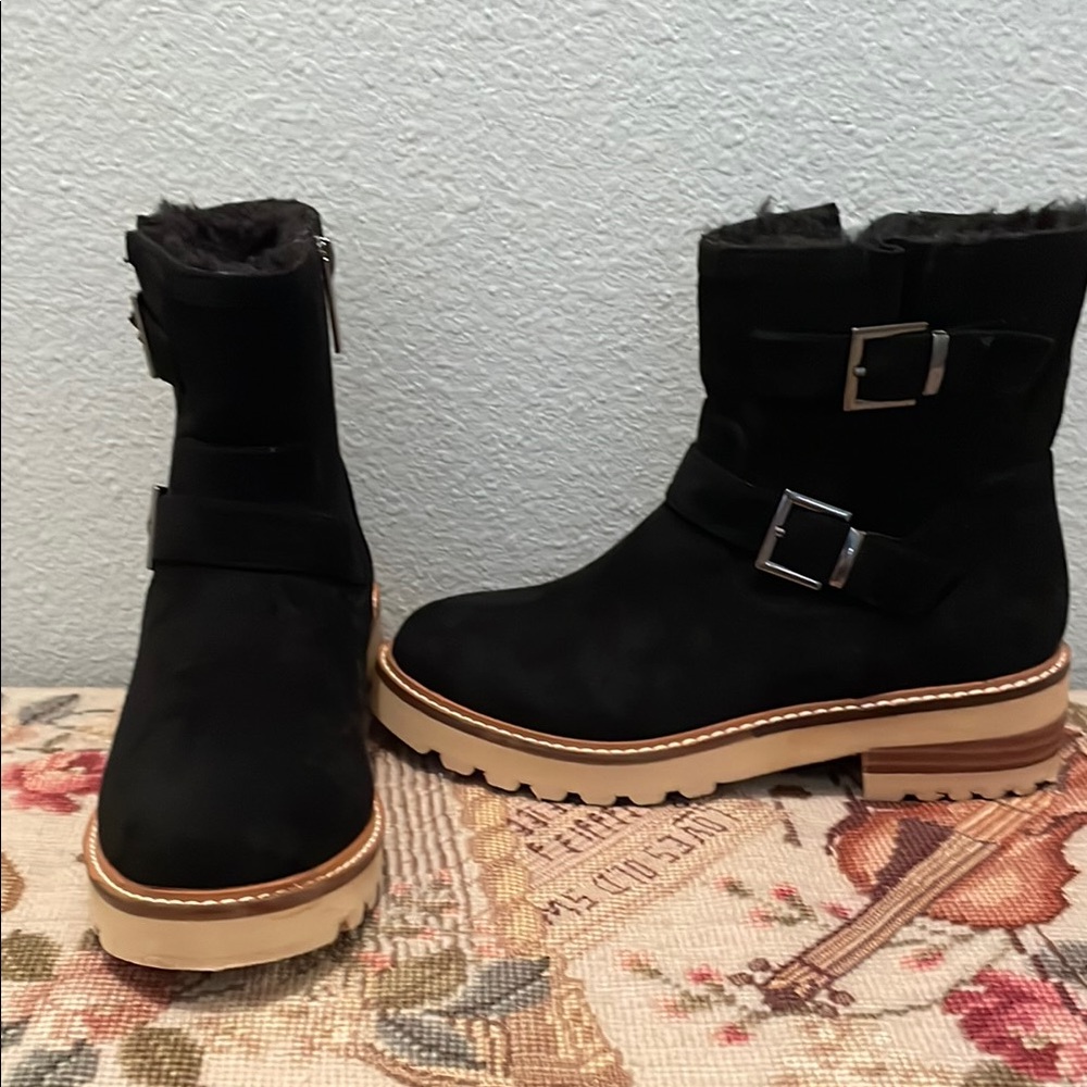 Black and Tan Winter Boots with Rugged Construction